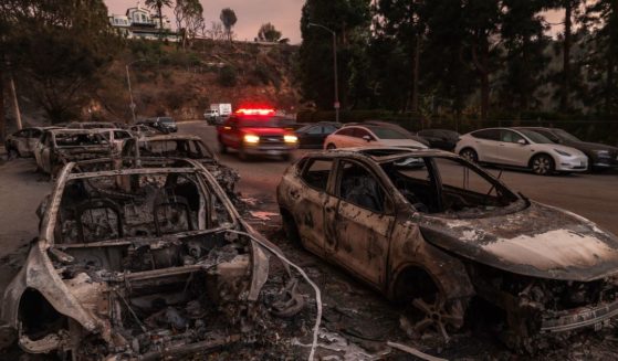 Scores of cars burned after being pushed out of the way by firefighters trying to reach the Pacific Palisades neighborhood of Los Angeles, California, on Jan. 10.