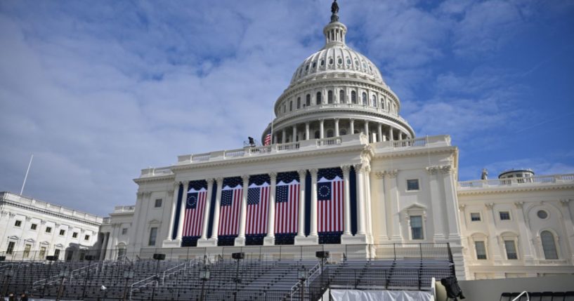 American flags are displayed Friday on the West Front of the U.S. Capitol building, where the presidential inauguration traditionally takes place in Washington, D.C.