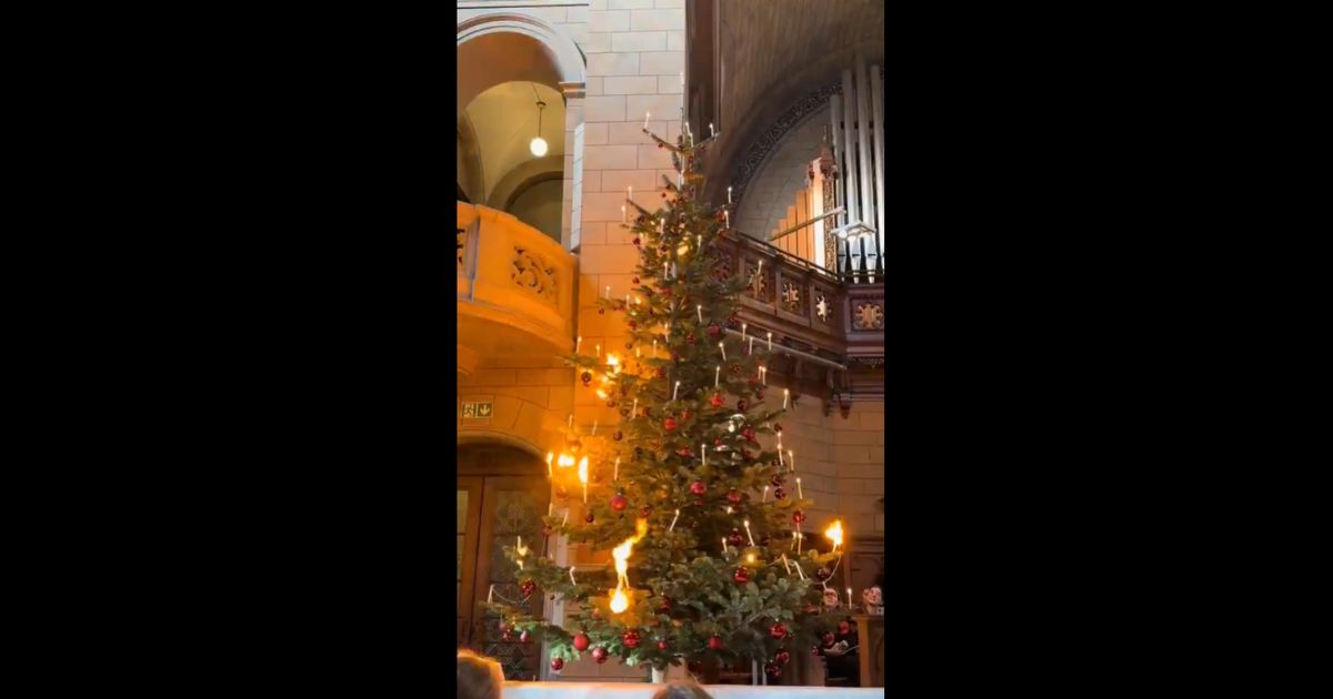 Fiery Display: Church Lights 50+ Christmas Tree Candles in 45 Seconds in Breathtaking Display