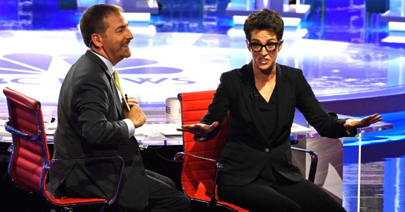 Chuck Todd, left, and Rachel Maddow are seen in a photo dated June 26, 2019, speaking to the audience during the Democratic presidential primary debate hosted by NBC News in Miami, Florida.