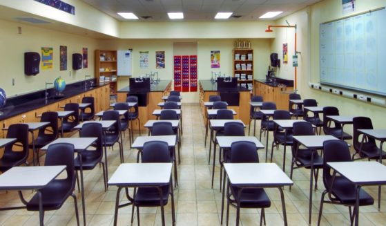 This stock image shows a high school science classroom.