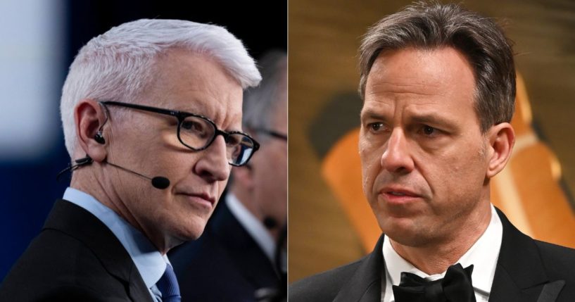 During a Sunday meeting, CNN employees - including Anderson Cooper, left, and Jake Tapper, right - were told to avoid covering President Donald Trump the way the network has in the past.