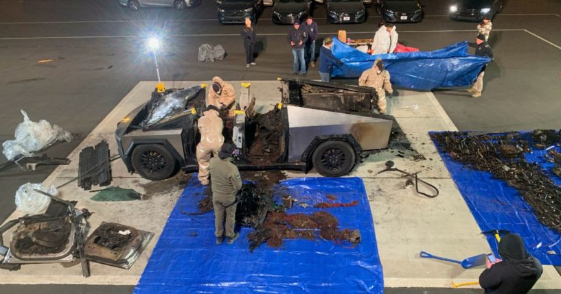 Investigators inspect the Tesla Cubertruck used in a bombing outside Trump Hotel in Las Vegas on Wednesday.