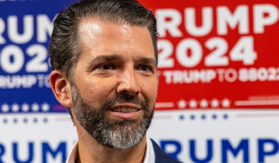 Donald Trump Jr. speaks to the media at a rally for his father in Charleston, South Carolina, on Feb. 23.