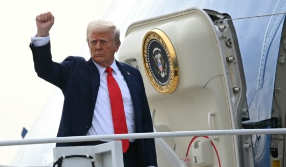 President Donald Trump boards Air Force One at Harry Reid International Airport in Las Vegas, Nevada, on Saturday.