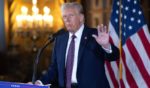 President-elect Donald Trump speaks to members of the media during a news conference at the Mar-a-Lago Club in Palm Beach, Florida, on Tuesday.