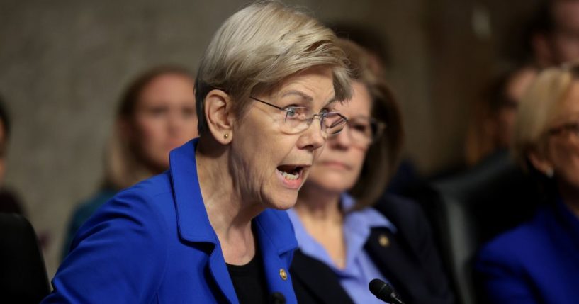 Senate Finance Committee member Sen. Elizabeth Warren begins yelling while questioning Health and Human Services Secretary nominee Robert Kennedy Jr. during his confirmation hearing in Washington, D.C., on Wednesday.