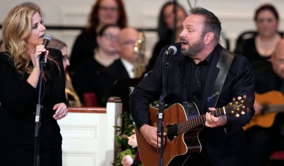 Garth Brooks and Trisha Yearwood are seen performing John Lennon's song "Imagine," which expresses an atheistic worldview, at a tribute service for former first lady Rosalynn Carter on Nov. 28, 2023, in Atlanta. The two sang the same song Thursday at the National Cathedral during a memorial service for former President Jimmy Carter, who died Dec. 29.