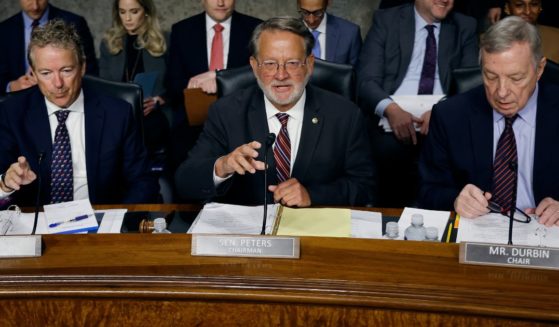 Sen. Randy Paul, left, Sen. Gary Peters, middle, and Sen. Dick Durbin, right, hold a joint hearing in the Dirksen Senate Office Building on Capitol Hill in Washington, D.C., on July 30.