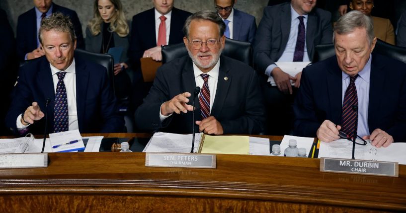 Sen. Randy Paul, left, Sen. Gary Peters, middle, and Sen. Dick Durbin, right, hold a joint hearing in the Dirksen Senate Office Building on Capitol Hill in Washington, D.C., on July 30.