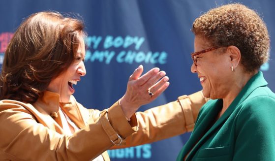 Vice President Kamala Harris prepares to embrace Los Angeles Mayor Karen Bass during a surprise appearance at the March for Reproductive Rights organized by Women’s March L.A. on April 15, 2023 in Los Angeles, California.