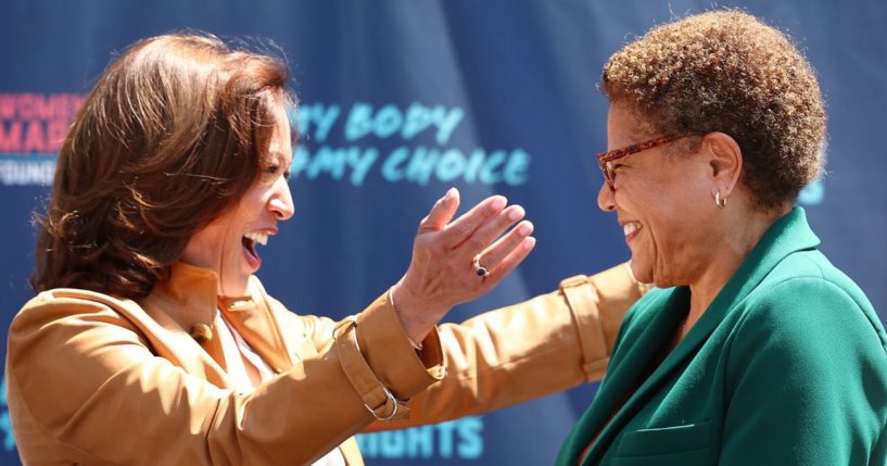 Vice President Kamala Harris prepares to embrace Los Angeles Mayor Karen Bass during a surprise appearance at the March for Reproductive Rights organized by Women’s March L.A. on April 15, 2023 in Los Angeles, California.