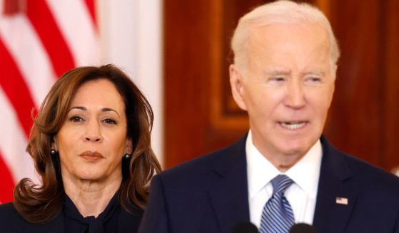 Vice President Kamala Harris, left, looks on as President Joe Biden delivers remarks on the recently announced cease-fire deal between Israel and Hamas in the Cross Hall of the White House in Washington, D.C., on Wednesday.