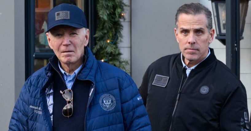 President Joe Biden, left, and son Hunter Biden, right, step out of a bookstore while shopping in Nantucket, Massachusetts, on Nov. 29.