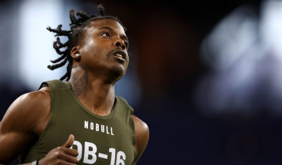 Khyree Jackson runs the 40-yard dash during the NFL Combine in Indianapolis, Indiana. on March 1, 2024.