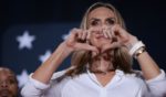 Lara Trump, Republican National Committee Co-chair and daughter-in-law of President-elect Donald Trump, reacts to the crowd after speaking at a town hall-style campaign event with Trump at the Crown Center Arena October 4, 2024 in Fayetteville, North Carolina.