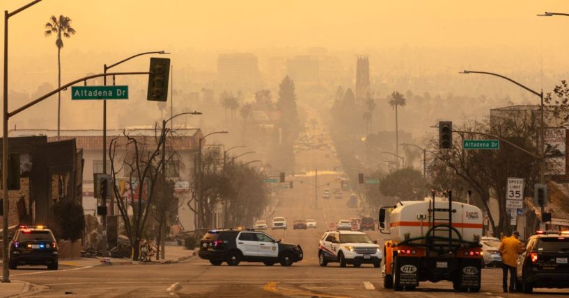 Smoke from the Eaton Fire blankets the air of Altadena, California, on Thursday.