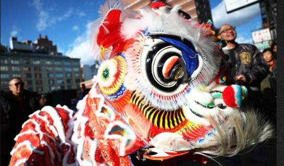 Lion dancers perform as people celebrate the Chinese Lunar New Year Wednesday in New York City.