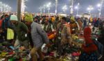 An attendee is carried away after a stampede before the "Amrit Snan" at the Kumbh Mela in Allahabad, India, on Wednesday.