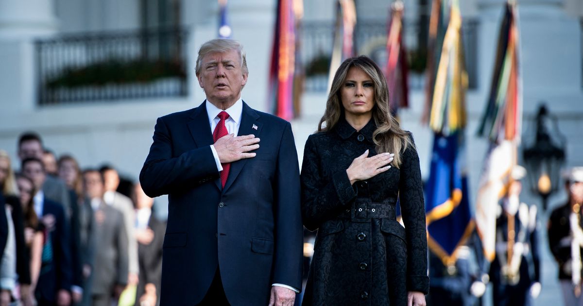 President-elect Donald Trump and First Lady Melania Trump observe a moment of silence in Washington, DC. in 2017.