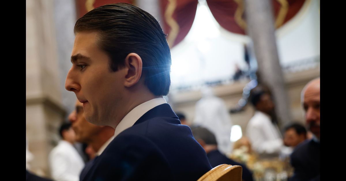 Barron Trump sits at a luncheon following the inauguration of President Donald Trump at the Capitol on Jan. 20, 2025.