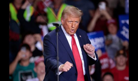 President Donald Trump dances a campaign rally in Grand Rapids, Michigan, on Nov. 5, 2024.