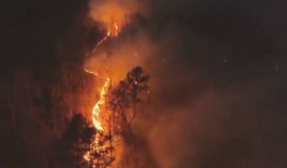 Drone footage captured a wildfire in Old Fort, North Carolina, on Wednesday.