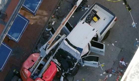 The truck used by Shamsud-Din Jabbar to drive through Bourbon Street in New Orleans on Wednesday morning during New Year's festivities is pictured from above as law enforcement investigates the scene.