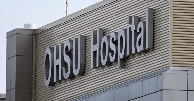 Signage is displayed outside the Oregon Health and Science University hospital in Portland, Oregon, on Jan. 23, 2024.