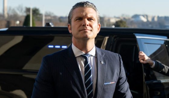 Defense Secretary Pete Hegseth speaks to the media upon arriving at the Pentagon in Washington, D.C., on Monday.