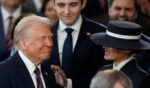 U.S. President Donald Trump and Melania Trump smile after his swearing in in the U.S. Capitol Rotunda on January 20, 2025 in Washington, DC.