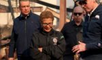 California Governor Gavin Newsom (R) and Los Angeles Mayor Karen Bass tour the downtown business district of Pacific Palisades as the Palisades Fire continues to burn on January 8, 2025 in Los Angeles, California.