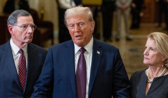 U.S. President-elect Donald Trump speaks to the media as Sens. John Barrasso (R-WY) (L) and Shelley Moore Capito (R-WV) look on at the U.S. Capitol on January 8, 2025 in Washington, DC.