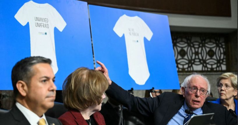 Sen. Bernie Sanders, an independent from Vermont, questions Robert F. Kennedy Jr. Wednesday during a Senate Finance Committee hearing on Kennedy's nomination to be Health and Human Services Secretary.