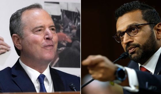 Democratic Sen. Adam Schiff of California, left, questions Kash Patel, President Donald Trump's choice to be director of the FBI, during a confirmation hearing Thursday before the Senate Judiciary Committee in Washington, D.C.