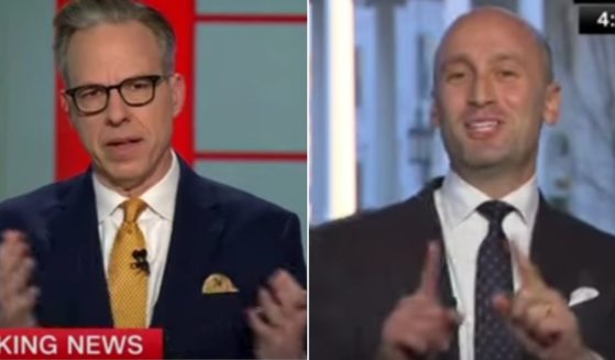 White House Deputy Chief of Staff Stephen Miller, right, called out CNN's Jake Tapper for his characterization of a comment Miller made about the vast majority of federal employees leaning politically to the far left.