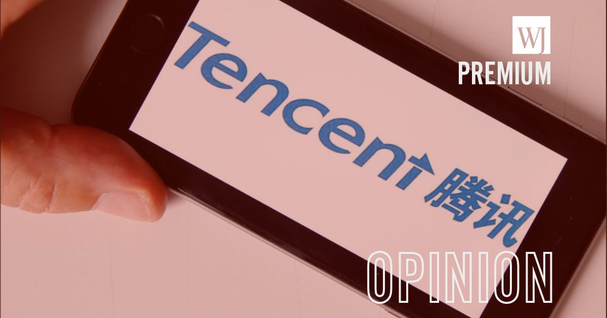 A photo illustration shows the logo of the world leader in video games, Tencent, displayed on the screen of an iPhone.