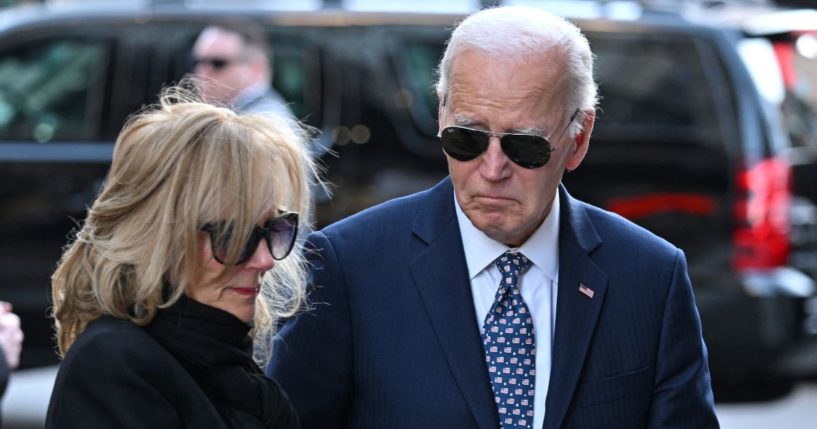 President Joe Biden, right, and first lady Jill Biden, left, pay their respects to victims of the Jan. 1 terrorist attack in New Orleans, Louisiana, on Monday.