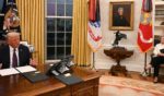 White House Chief of Staff Susie Wiles watches as President Donald Trump speaks to journalists in the Oval Office of the White House in Washington, D.C., on January 20, 2025.