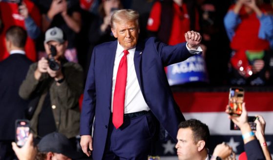 Now-President-elect Donald Trump gestures as he leaves after speaking at his last campaign rally in Grand Rapids, Michigan, on Nov. 5.