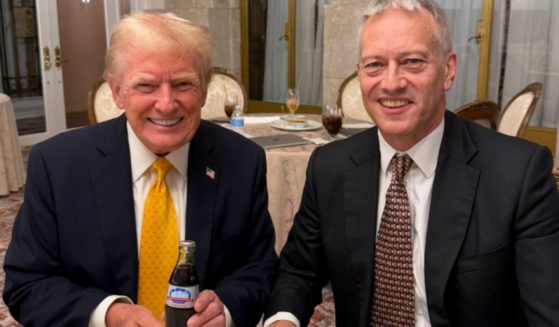 On Tuesday Coca-Cola CEO James Quincey, right, presented President-elect Donald Trump, left, with a special commemorative bottle of Diet Coke.