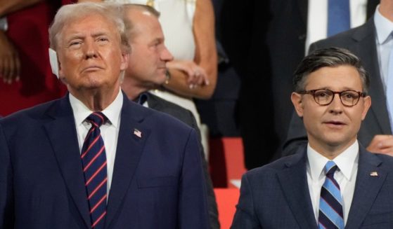 Now-President Donald Trump and Speaker of the House Mike Johnson look on during the Republican National Convention in Milwaukee, Wisconsin, on July 17.