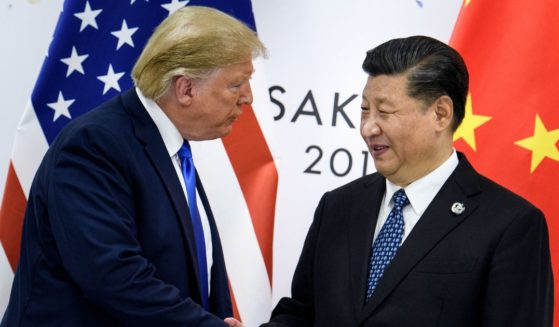 Then-President Donald Trump, left, shakes hands with China's President Xi Jinping, right, before a bilateral meeting on the sidelines of the G20 Summit in Osaka on June 28, 2019.