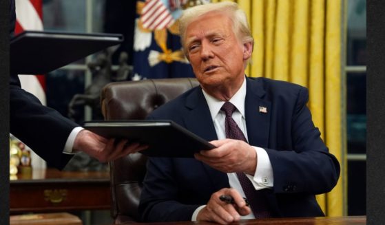 President Donald Trump signs executive orders in the Oval Office of the White House, Monday in Washington. He is expected to quickly sign the Laken Riley Act as the first bill of his second term.