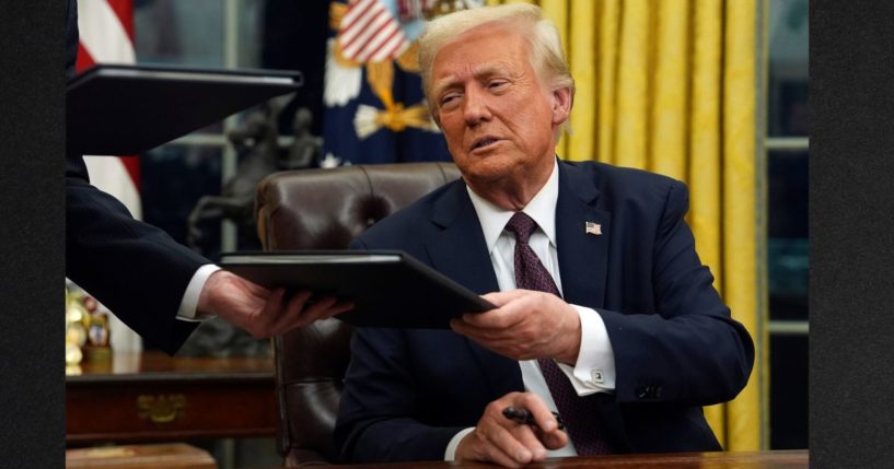 President Donald Trump signs executive orders in the Oval Office of the White House, Monday in Washington. He is expected to quickly sign the Laken Riley Act as the first bill of his second term.