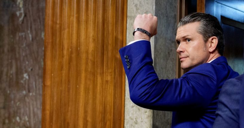 U.S. President-elect Donald Trump's nominee for Secretary of Defense Pete Hegseth pumps his fist after a Senate Armed Services confirmation hearing on Capitol Hill on January 14, 2025 in Washington, DC.