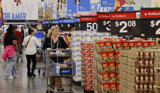 Shoppers at the Walmart Supercenter shop during Walmart's multi-week Annual Deals Shopping Event in Burbank, California, on Nov. 21.