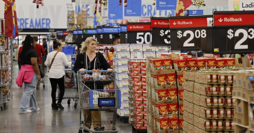 Shoppers at the Walmart Supercenter shop during Walmart's multi-week Annual Deals Shopping Event in Burbank, California, on Nov. 21.