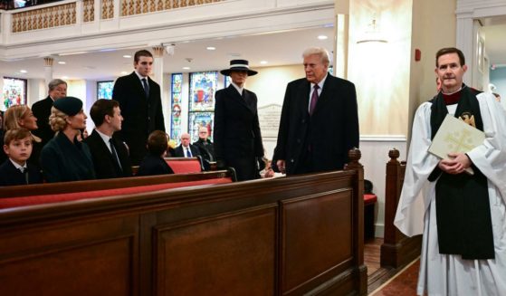 US President-elect Donald Trump, trailed by Melania Trump and son Barron Trump, arrives for a church service at St. John's Episcopal Church, Lafayette Square in Washington, DC, January 20, 2025.