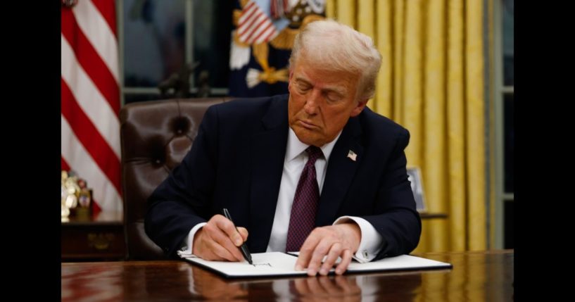 President Donald Trump signs executive orders in the Oval Office of the White House on January 20, 2025 in Washington, DC. Trump takes office for his second term as the 47th president of the United States.